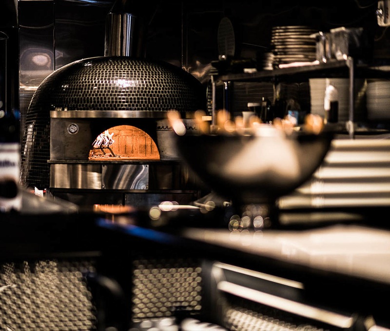 Adoro Lei’s sophisticated wood-burning stove showcases the restaurant’s passion for pizza.