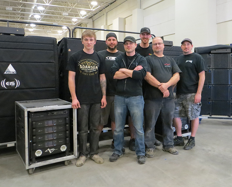 The Audio Visions team with the new Adamson E-Series rig: (front left to right): Shane Miller, Elliot Nielsen, Erik Rudd, Andy Kenkel, (back left to right): Jasper Goforth, Luke Scroggin.