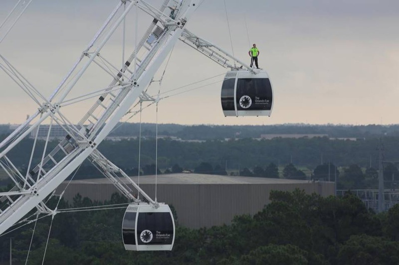 Nik Wallenda Standing on Top of One of the Orlando Eye Capsules