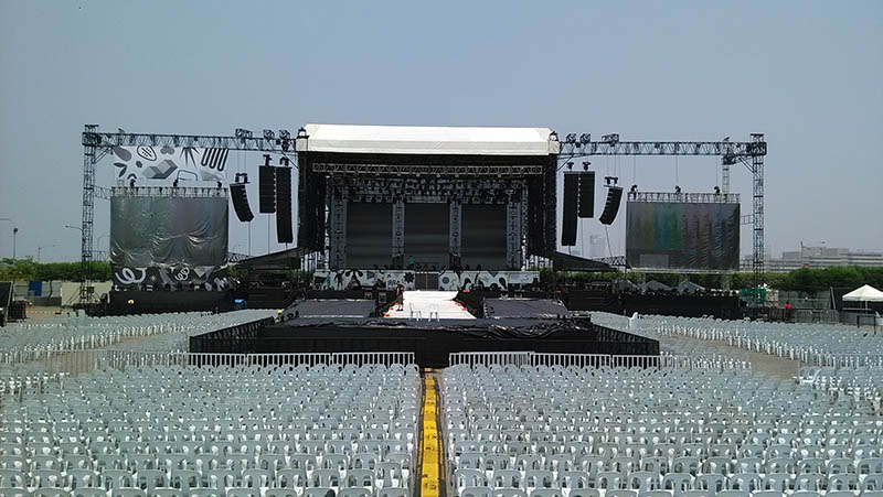View of the stage for One Direction "On the Road Again" tour, with audio array from Harman's JBL VTX Line Array and Crown I-Tech HD amps