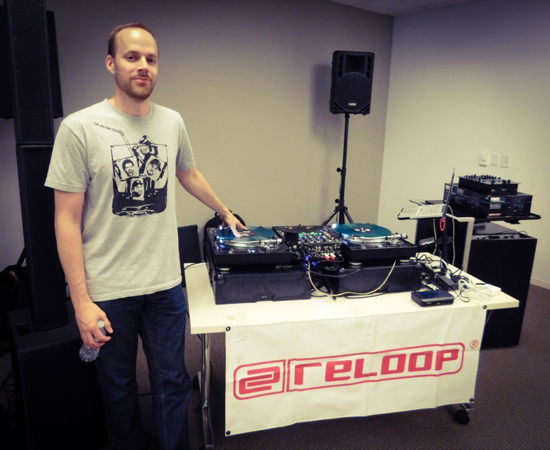 Chris Karns next to Reloop Equipment
