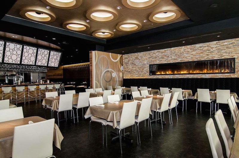 The dining room of the newly renovated Addison, Texas location of Gloria’s Latin Cuisine, featuring immersive AVL sourced through Guitar Center Professional. Photo courtesy of Custom Audio Video Services. © 2015.