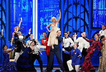 Kristen Chenoweth and the cast of 'On the Twentieth Century' perform onstage at the 2015 Tony Awards at Radio City Music Hall on June 7, 2015 in New York City. (Photo by Theo Wargo/Getty Images for Tony Awards Productions)
