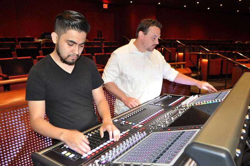 Tobin Center’s Erik Montoya (left) and Sean Jenkins at the DiGiCo SD5 console