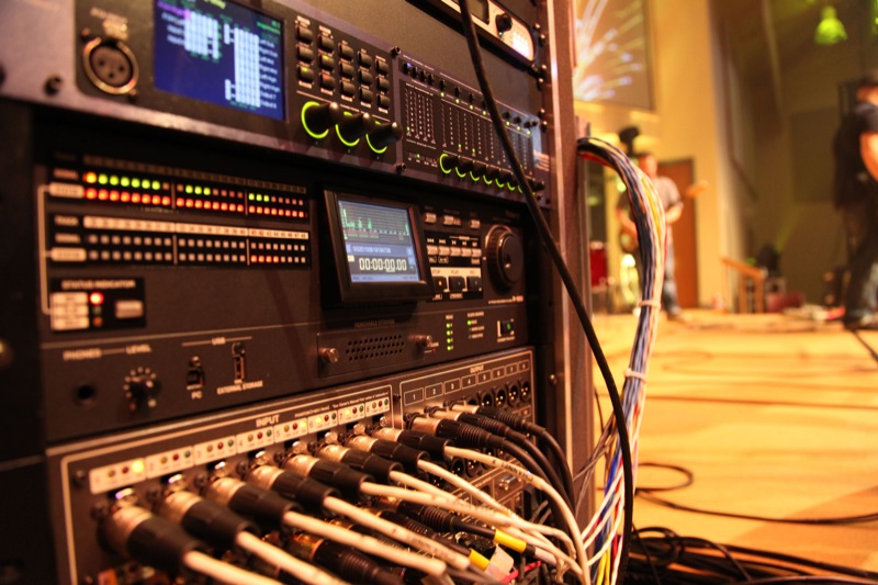At a recent event in Denver, Nebraska-based firm Inspirmedia provided A/V services and components, including Roland Professional A/V components such as the R-1000 48-Track Recorder/Player and S-2416 Digital Snake Stage Unit, both visible in the rack. (c) Inspirmedia 2015. 