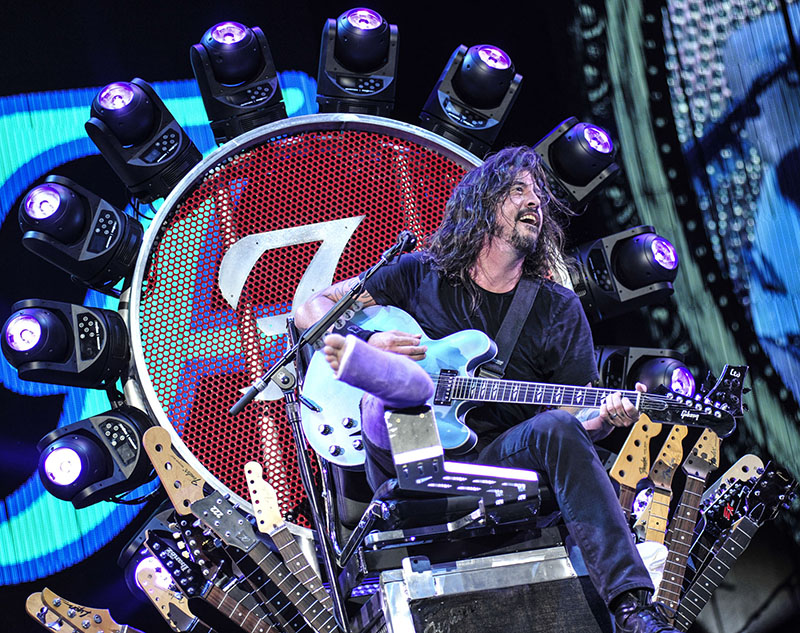 Despite his broken leg, Foo Fighters’ Dave Grohl rocks Washington D.C.’s RFK Stadium on July 4 from his self-designed motorized throne (c) Andy Tennille