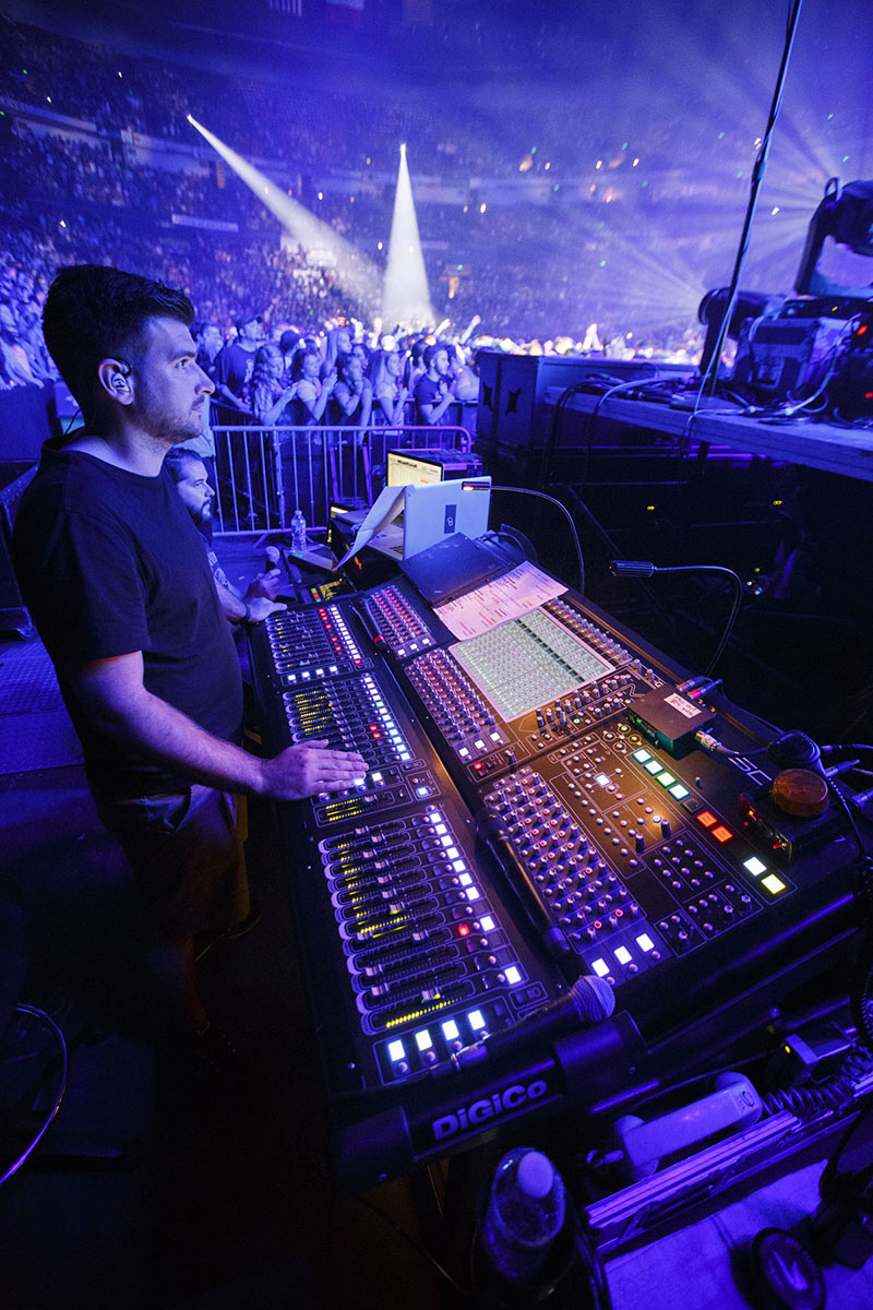 Kevin Dennis running the DiGiCo SD10 monitor mix desk. Photo by Jack Edinger