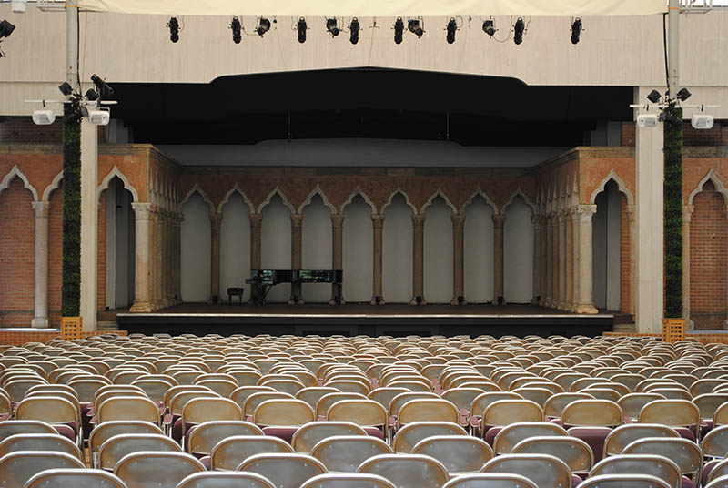 Although orchestral performances in the tented space are unamplified, the venue adds microphones and speaker system for vocalists and other performances. 