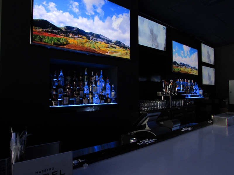 The bar at Strike 10 Bowling & Sports Lounge in Hallandale Beach, Florida, featuring fantastic sound and lighting, thanks to Guitar Center Professional and GC Pro Affiliate Program member Automated Interiors Inc.