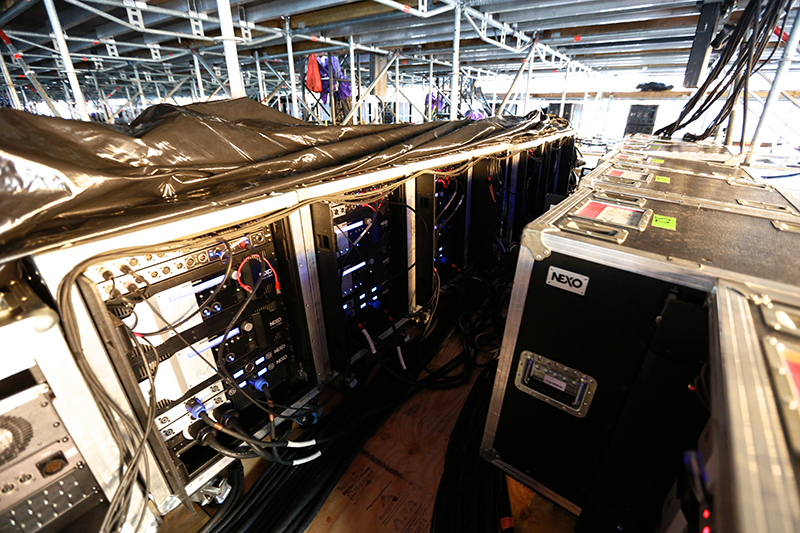 Amps power the system from under the stage.