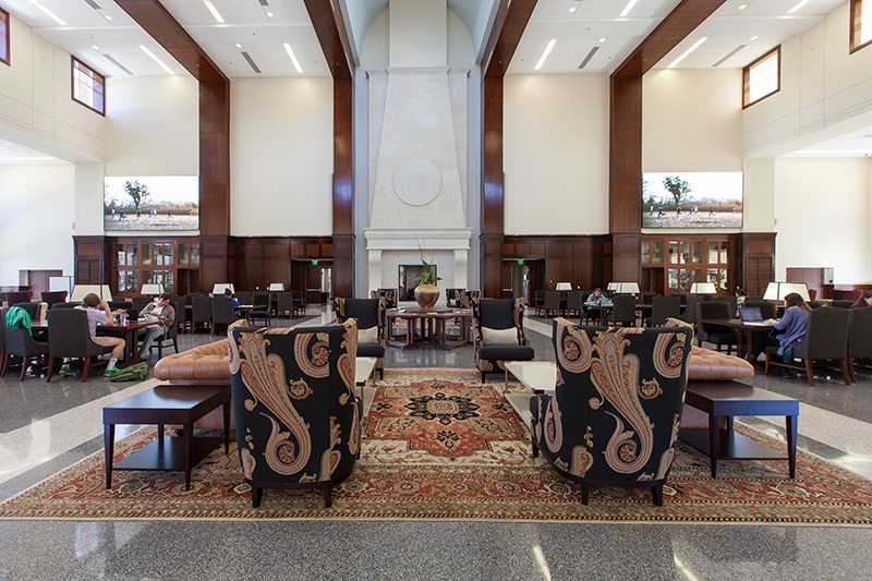 Two, color-matched CAL 96 loudspeakers are mounted 13 feet high alongside wood-finish columns flanking the hall’s massive fireplace