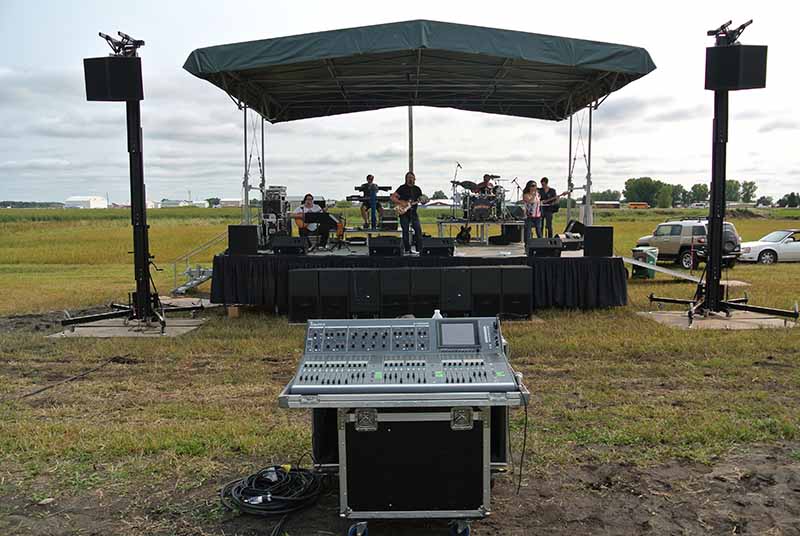 Tender Sound performing a check for a Vietnam Veterans Memorial performance for Rickie Lynn.