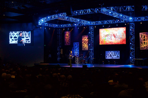 Along with the audio gear, the design integrated three video walls, a motorized trussing system and a theatrical lighting system comprised of over six dozen fixtures including par, ellipsoidal and moving head fixtures.