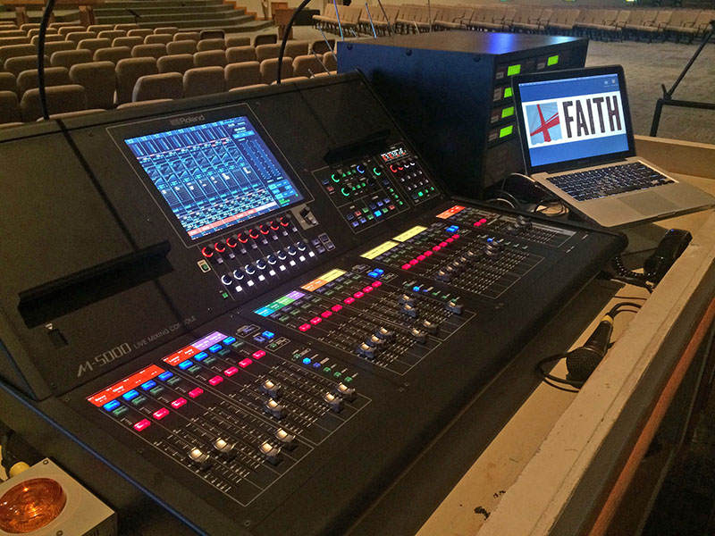 Film Otter, Inc., an AV firm focusing on installations in houses of worship, helped Faith Lutheran Church upgrade both its Oakville and Columbia, MO facilities with Roland consoles. Pictured here is the front-of-house position at Faith Lutheran Church in the Oakville area of St. Louis, MO, featuring a Roland M-5000 OHRCA Live Mixing Console.