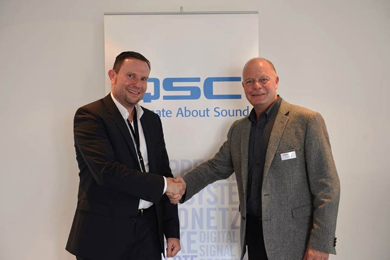Pictured here, from left, is Chris Hellmuth from VIVID and Glen Harris from QSC.