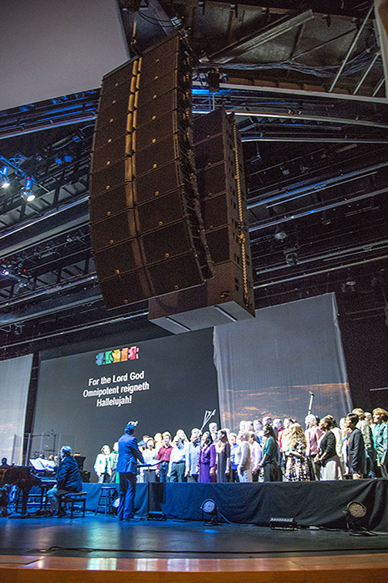 Left and right arrays of 10 L-Acoustics K2 enclosures are each backed by flown arrays of six SB28 subs