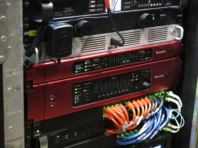 A gear rack at the Foo Fighters’ FOH position, featuring Focusrite RedNet D16R and RedNet 4 (system alignment/monitoring).