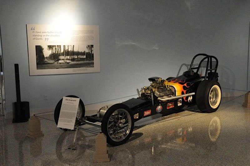 An exhibit at the Auburn Cord Duesenberg Automobile Museum in Auburn, Indiana, featuring one of seven Bose L1 Compact portable line array sound systems (left).