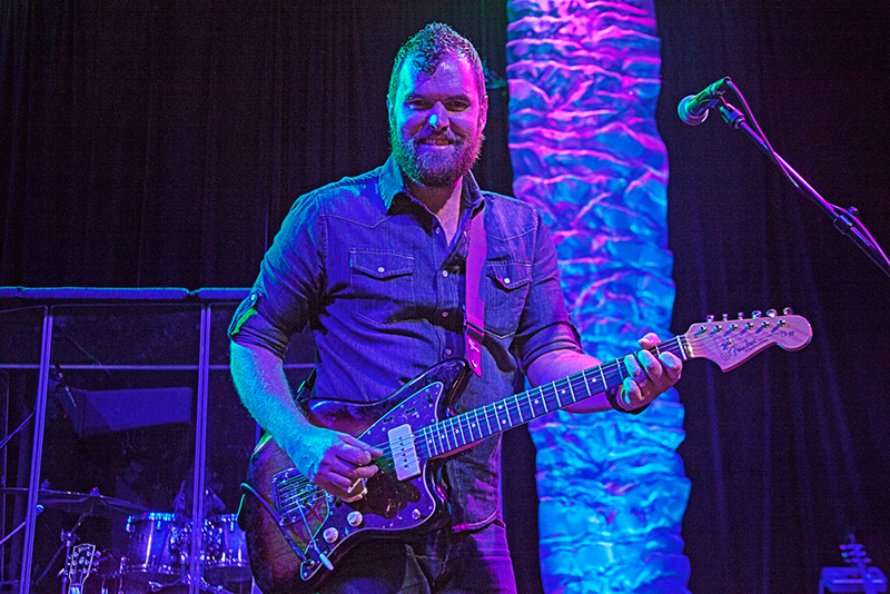 JP Dutton, Worship Director on the guitar.