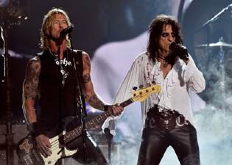 Musician Duff McKagan (L) and singer Alice Cooper of Hollywood Vampires perform onstage during The 58th GRAMMY Awards at Staples Center on February 15, 2016 in Los Angeles, California. (Photo by Kevork Djansezian/Getty Images)