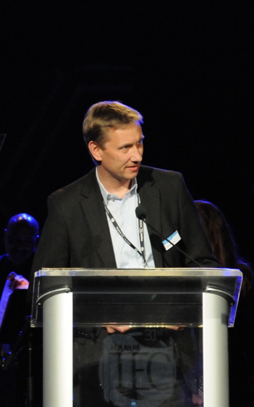 Jürgen Kockmann, Sennheiser Project Manager for evolution wireless D1, accepting the NAMM Foundation Outstanding Technical Achievement award for the Sennheiser ew D1 system during a ceremony held at the Anaheim Hilton on January 23, 2016.