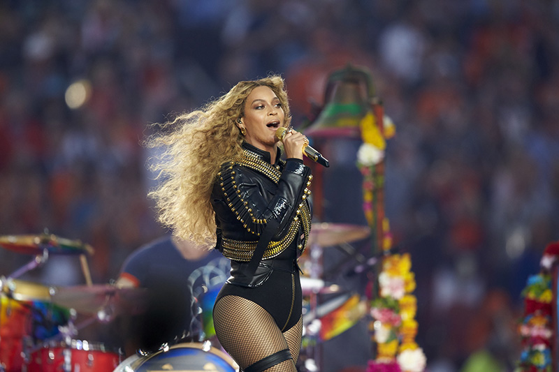 Beyonce performs at the halftime show, Super Bowl 50. Photo by Simon Bruly, Getty Images