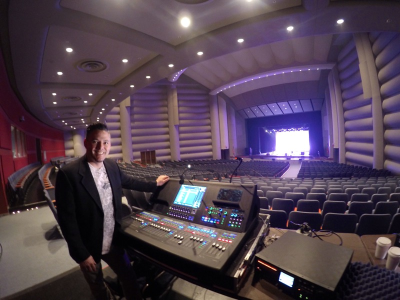 Vocalosity Technical Director and Front-of-House Engineer Tony Huerta, pictured with the Roland M-5000 OHRCA Live Mixing Console.