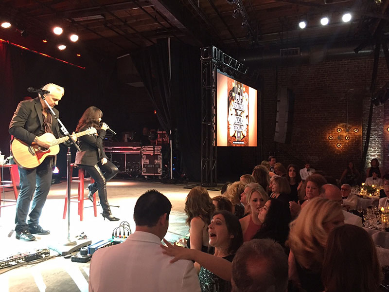 Pat Benatar. is pictured here performing at The Mill & Mine in Knoxville, TN with Neil Giraldo.