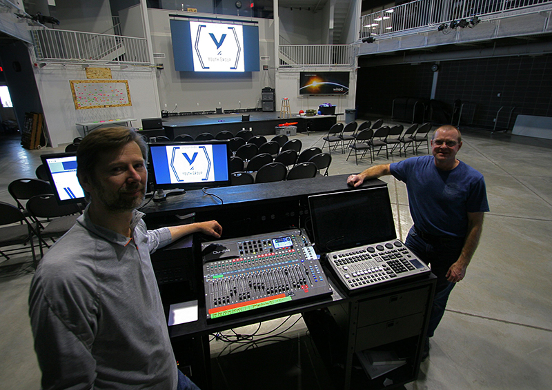 Crossroads’ Technical Arts Director, Wally Hildebrandt (l) and Parkland Audio owner, Mike Fleming (r), with the Qu-24 in the Youth Room