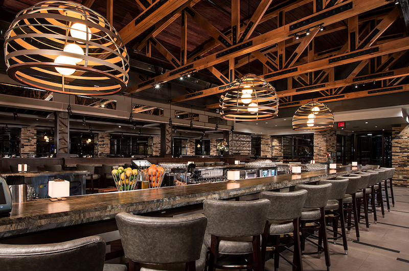 The bar area of the J. Alexander’s restaurant in Columbus, OH with an audio system featuring components from Bose Professional.