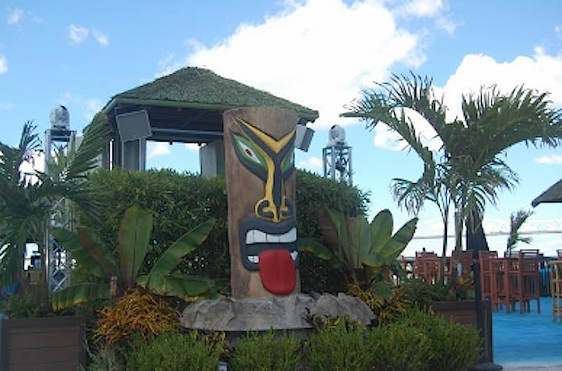 Lost DayClub at Tiki Island entrance with Community Loudspeakers and “Tiki Fred."