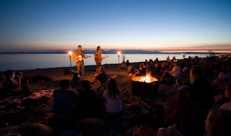 Throughout the summer, Artist Home sponsors the Bonfire Series of outdoor shows, held after sunset at a Seattle-area beach.