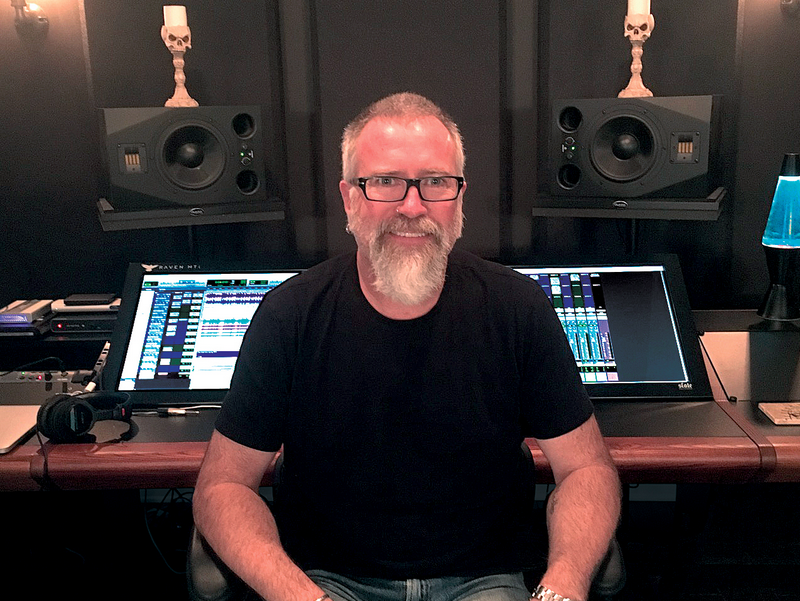 Brad Divens, pictured in his personal mix room, recently outfitted with acoustical treatment solutions from Auralex.