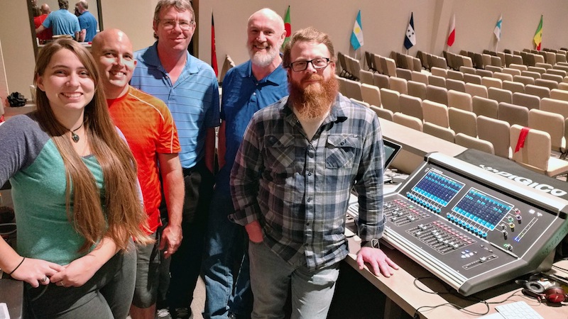 Shawn Turner (second from left) and the Oak Grove Baptist Church production crew with their DiGiCo S21 mixing console at FOH.