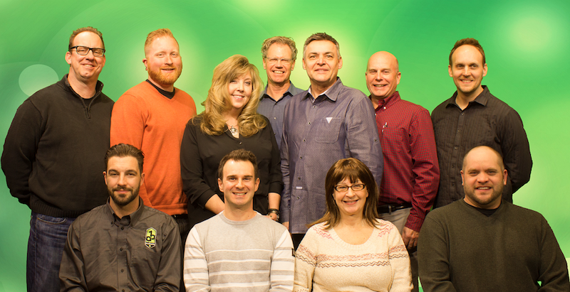 Audio Biz team. Back row: Steve Krizka, Shawn McLoughlin, Beth Mickel, Randy Stenson, Don Stockfleth, Rick Brown, Travis Brown; Front row: Brian Christ, Nick Nitti, Julie Boatright, Shane McGary.