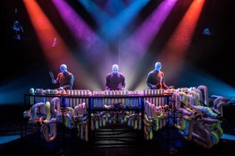 Blue Man Group performances are remarkable in part for their use of unconventional instrumentation, featuring an array of percussive sound-makers made from materials including PVC. (Photo credit: Lindsey Best, courtesy Blue Man Group)