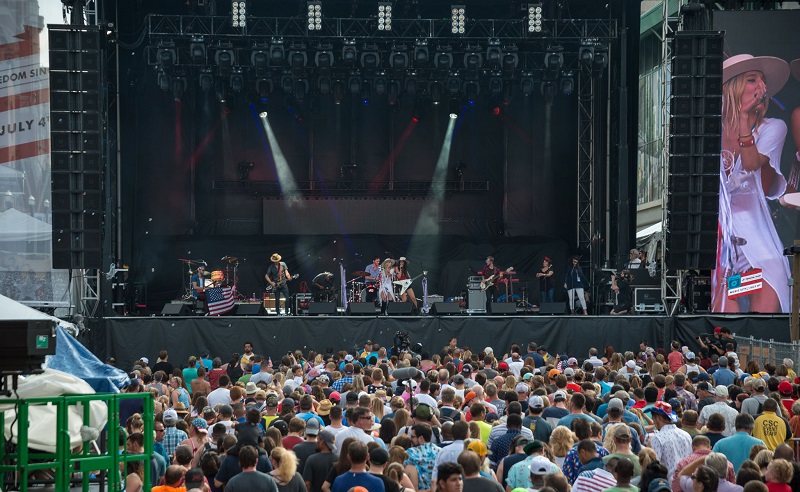 Ruby Stewart and her band, The Sisterhood, performing on the Broadway Stage at Broadway and Fifth Avenue in Nashville for Let Freedom Sing! Music City July 4th