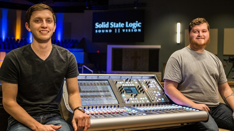 Rusty Trowbridge, Technical Director (left) and Spencer Wells, AV Technician (right) with one of the new SSL L300 Live consoles at Southcrest Baptist Church, Lubbock, Texas.