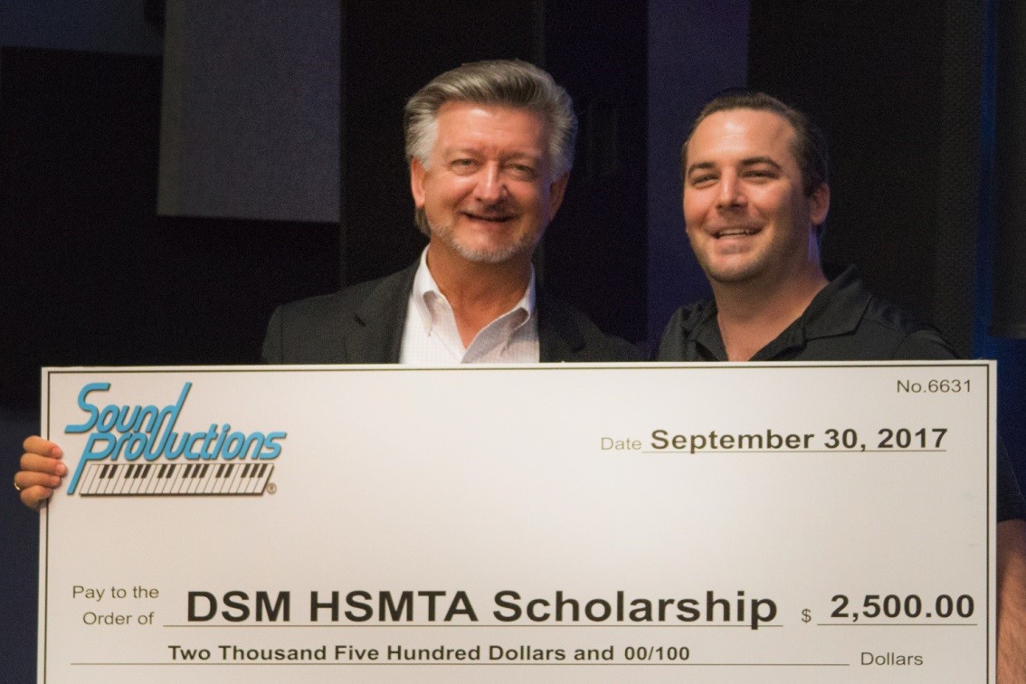 (From Left to Right) DSM’s High School Musical Theatre Awards Director, Tracy Jordan receiving a Scholarship check from Sound Pro’s President Joshua Curlett.