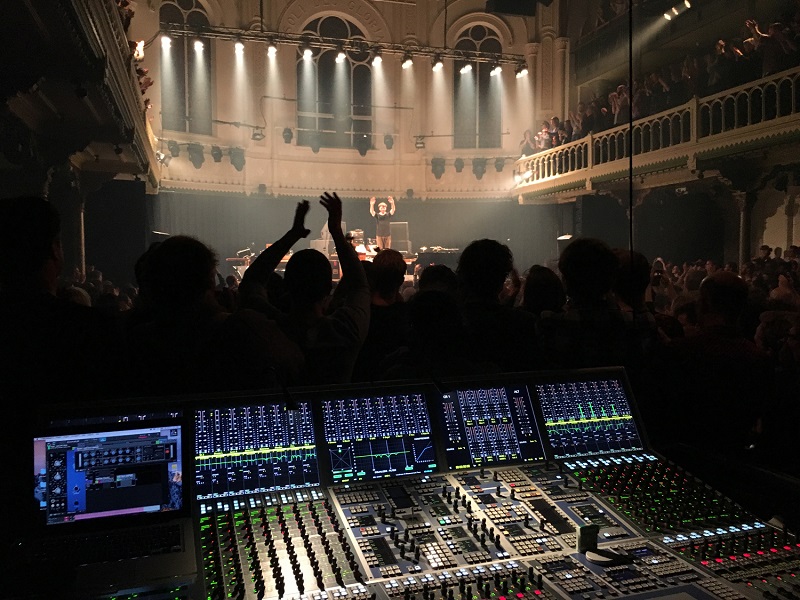 Nils Frahm on stage at the concert hall Paradiso in Amsterdam, in front the FOH mixing console AURUS platinum