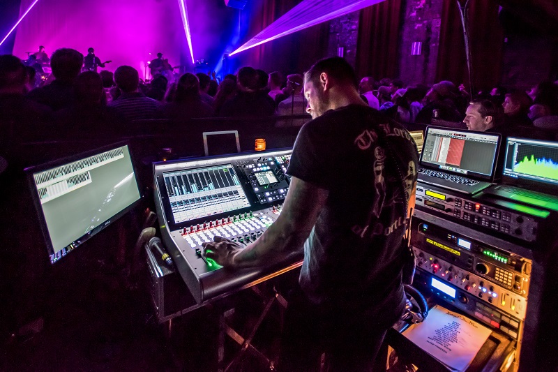 Front of House Engineer Charlie Izzo at the SSL L300 Live console during a recent Portugal. The Man show.