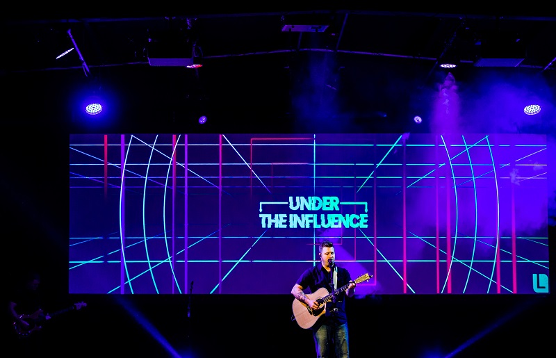 The church is based in a large facility that originally served as a manufacturing warehouse with “a variety of acoustic challenges in a space that wasn’t designed as a worship sanctuary.
