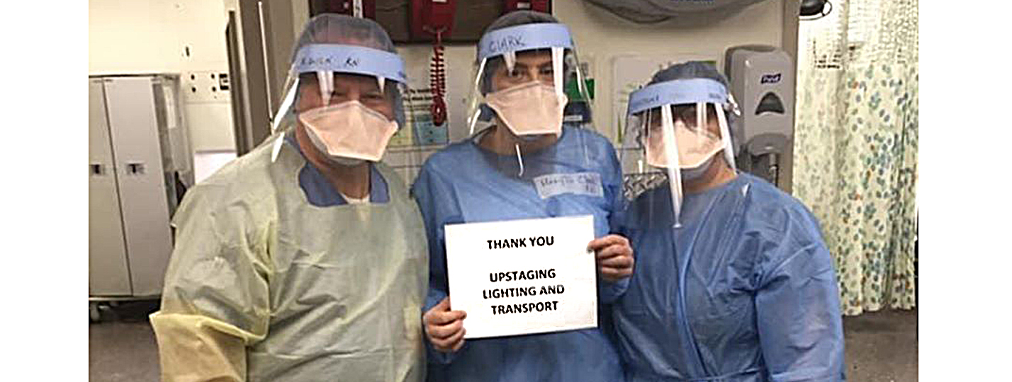 Health care workers take a moment to thank Upstaging, an event production company specializing in concert touring, who has been making protective face shields in its Sycamore, IL-based facilities.