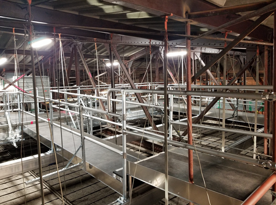 The new custom access platform system helps revolutionize storage and sound access in the historic building