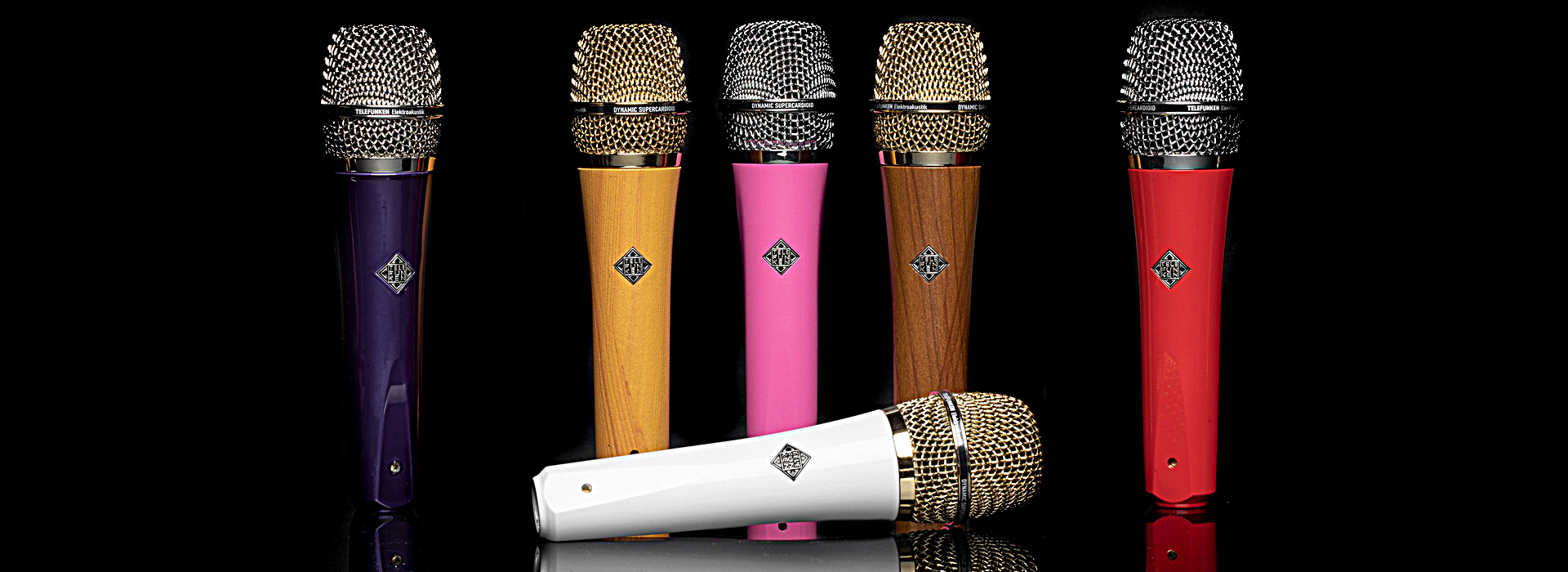 TELEFUNKEN Elektroakustik now offers the Custom Shop Configurator for its TEC Award-winning line of dynamic microphones. Hand assembled in the USA, M80 and M81 wired microphones and wireless capsules can now be ordered in a wide array of body colors in solid, metallic or wood finishes with matching or contrasting headgrille colors and custom finishes. TELEFUNKEN's series of dynamic cardioid microphones provide extremely wide frequency response and high SPL capabilities, delivering a condenser-like performance in a rugged design equally suitable for voice, instruments or drums on both stage and in the studio. The directional pickup pattern and frequency response yield a microphone that provides an ideal blend of functionality, isolation, and a distinctively pleasing tone. TELEFUNKEN's dynamic mics incorporate a low-mass voice coil with an extremely thin Mylar membrane and a quality output transformer. The M80's response is clear and controlled, capturing the nuances of a performance with great detail, while keeping sibilance and handling noise to a minimum. On drums, the sound is tight, punchy and open, with emphasis on the initial attack. A smooth frequency response, clarity, and detailed mid-range make the M81 an ideal tool for taming brighter vocals, guitar tones, and fattening up toms, horns, or other thinner sounding sources. The extremely rugged design is built to withstand severe performance abuse, while its variety of finishes, recessed Telefunken badge, and metallic headgrille give it the classic Telefunken look. Learn more about the Custom Shop Configurator: https://www.telefunken-elektroakustik.com/customshop