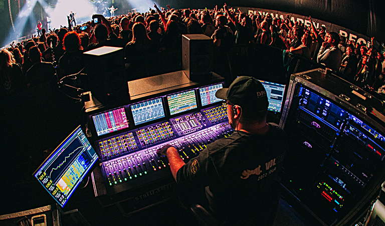 FOH mixer Dennie Miller at work. Photo: Britt Bowman