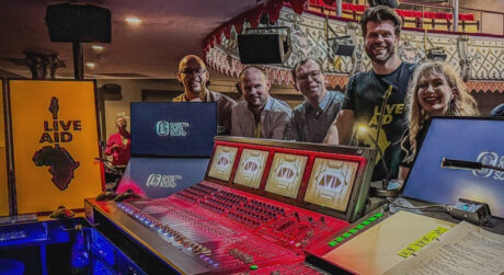 Sound Designer Gareth Owen’s (in logo t-shirt, shown here with the show’s sound team) vision modernizes iconic benefit concert with state-of-the-art audio tech