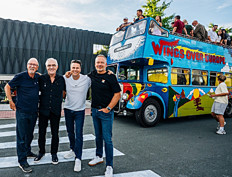 To mark the Adam Hall Group’s 50th anniversary, Paul McCartney and his band Wings’ restored 1972 psychedelically painted, double-decker tour bus has been presented to the public for the first time on the company’s campus.